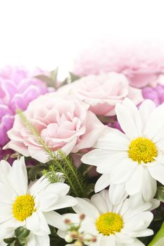 Fading background of flower arrangement with pink and white flowers