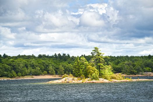 Small island and beach in Killbear provincial park near Parry Sound, Ontario Canada