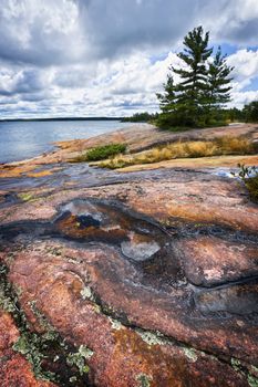 Rocky lake shore of Georgian Bay in Killbear provincial park near Parry Sound, Ontario Canada