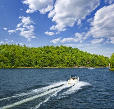 Motorboat on summer lake in Georgian Bay, Ontario, Canada