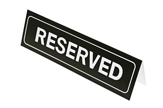 Reserved sign for restaurant table isolated on white background