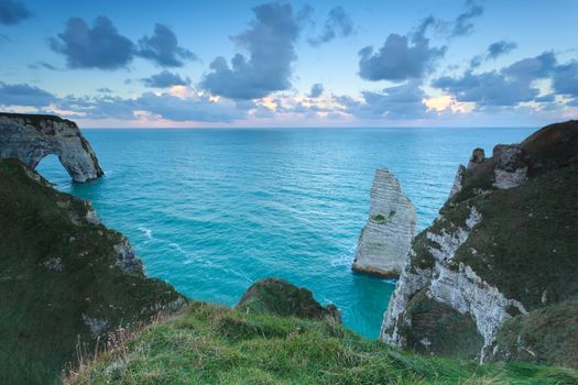 morning sky over Atlantic ocean and cliffs, Etretat, France