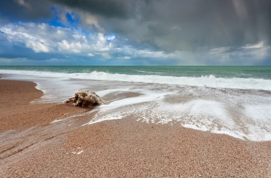 waves on sand Atlantic ocean beach, Normandy, France