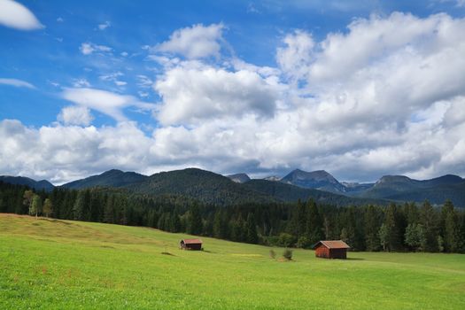 alpine green meadows and blue sky, Bavaria, Germany