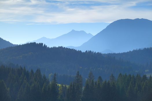 Karwendel mountain range in misty fog, Bavaria, Germany