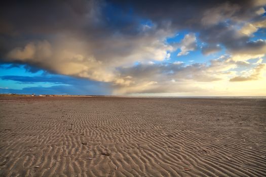 sunset sky over sand beach, Ijmuiden, Netherlands