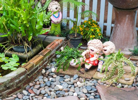 Garden ornament doll and welcome in Thailand