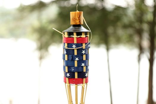 An outdoor candle decoration in a patriotic manner