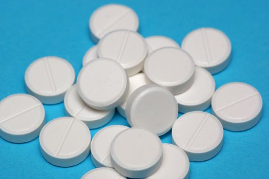 Round circular tablets containing prescription medicine