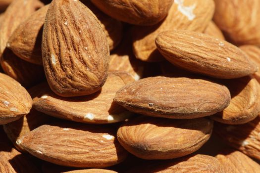A pile of almonds as seen close up from above