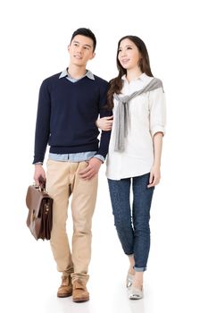 Young attractive Asian couple, full length portrait isolated on white.