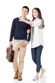 Young attractive Asian couple, full length portrait isolated on white.