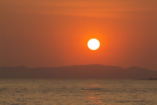 Beautiful sunset with the sea in Thailand 