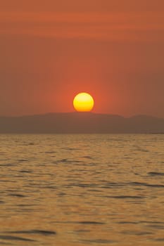 Beautiful sunset with the sea in Thailand 