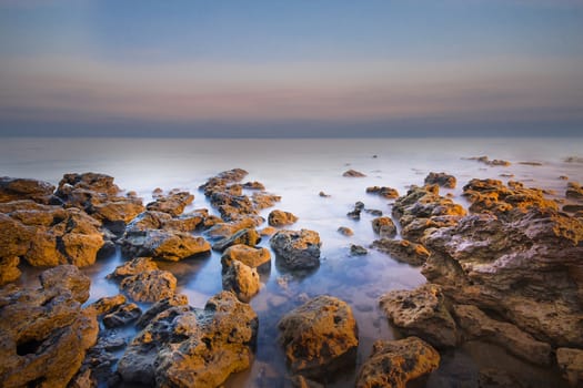 View of a winter Sea and rocks. Long exposure shot.