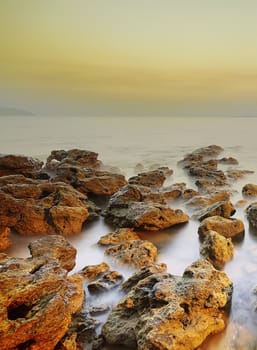 View of a tropical Sea and rocks. Long exposure shot.