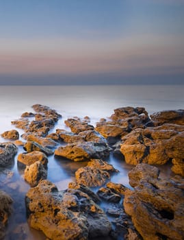 View of a winter Sea and rocks. Long exposure shot.