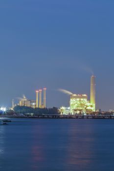 Power plant with bay on night time