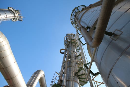 Refinery tower in petrochemical plant with blue sky 