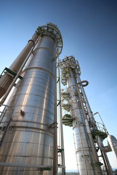 Refinery tower in petrochemical plant with blue sky 