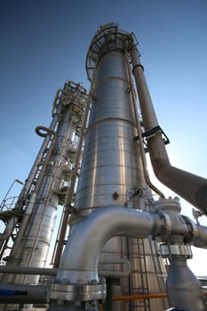 Refinery tower in petrochemical plant with blue sky 