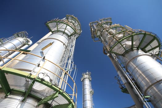 Refinery tower in petrochemical plant with blue sky 