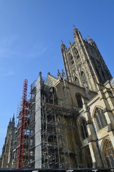 Canterbury Cathedral having renovation work being carried out with scaffolding on its exterior.