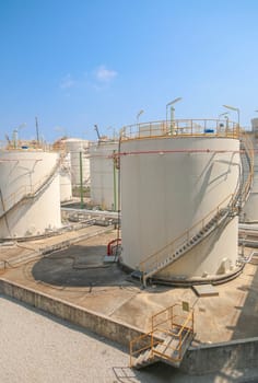Tank storage in chemical factory with blue sky in summer day 