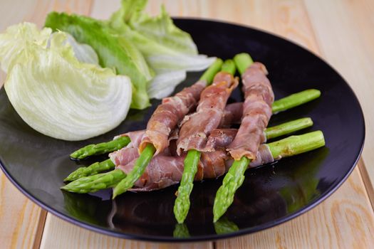 Grilled asparagus warapped in Parma ham 