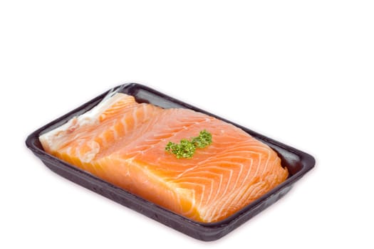 salmon steak red fish on plastic packet with clipping path