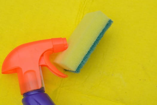 Close up of cleaning spray and sponge