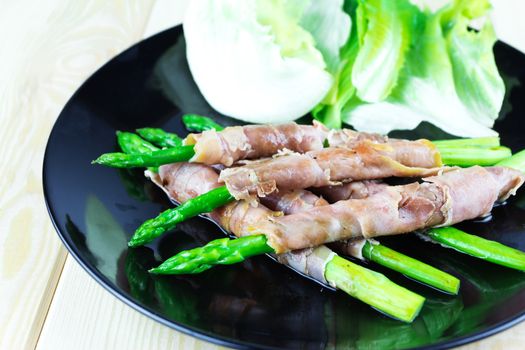 Grilled asparagus warapped in Parma ham 