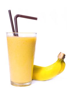 Banana smoothie in glass on white background