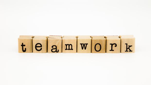 closeup teamwork wording isolate on white background