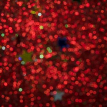 Red and green holiday bokeh. Abstract Christmas background 