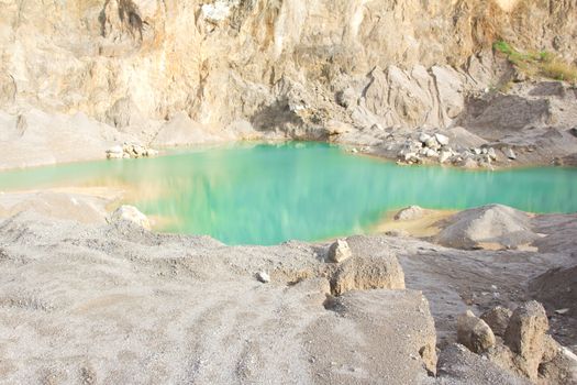 Blue lake in mining industrial 