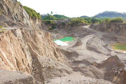 Blue lake in mining industrial crater