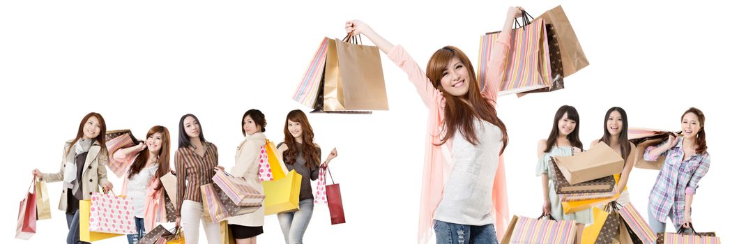 Happy Asian shopping girls on white background.