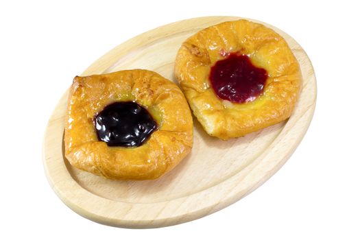 danish pastry with strawberries jam , blueberries jam on white background