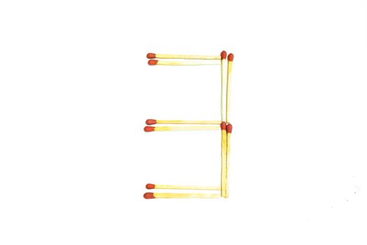 Numbers 3 made of matches on a white background