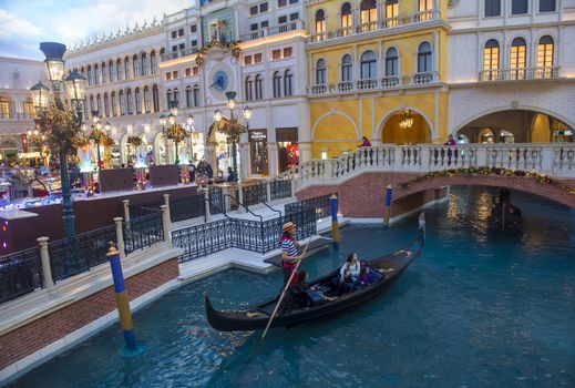 LAS VEGAS - JAN 05 : The Venetian hotel and replica of a Grand canal in Las Vegas on January 05, 2014. With more than 4000 suites it`s one of the most famous hotels in the world