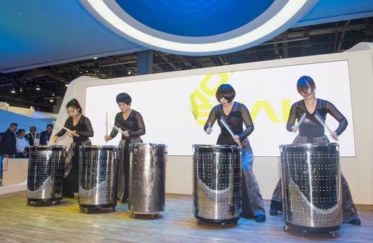 LAS VEGAS - JANUARY 10 : Group of drummers at the CES show held in Las Vegas on January 10 2014 , CES is the world's leading consumer-electronics show 