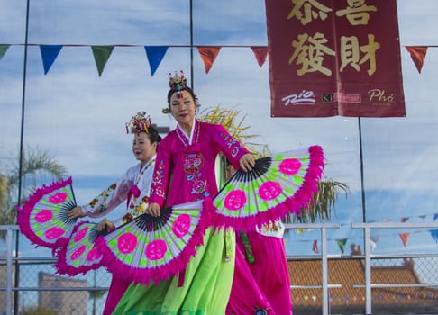 LAS VEGAS - FEB 09 : Chinese folk dancers perform at the Chinese New Year celebrations held in Las Vegas , Nevada on February 09 2014