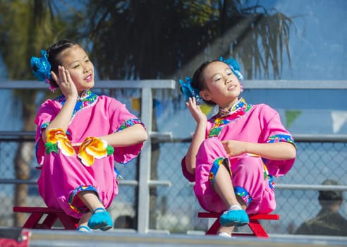 LAS VEGAS - FEB 09 : Chinese folk dancers perform at the Chinese New Year celebrations held in Las Vegas , Nevada on February 09 2014