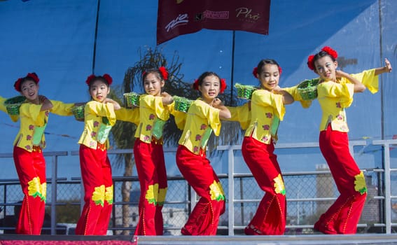 LAS VEGAS - FEB 09 : Chinese folk dancers perform at the Chinese New Year celebrations held in Las Vegas , Nevada on February 09 2014