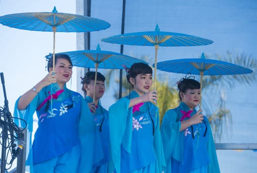 LAS VEGAS - FEB 09 : Chinese folk dancers perform at the Chinese New Year celebrations held in Las Vegas , Nevada on February 09 2014