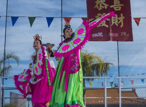 LAS VEGAS - FEB 09 : Chinese folk dancers perform at the Chinese New Year celebrations held in Las Vegas , Nevada on February 09 2014