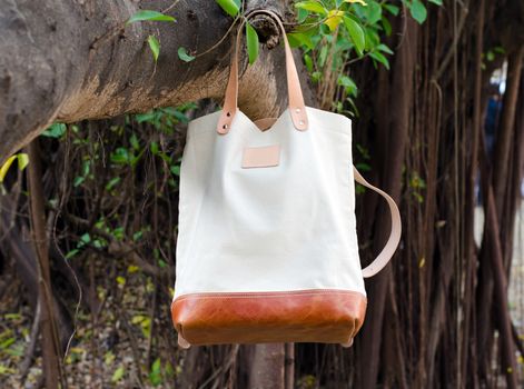 Fashion Canvas Bags hang on banyan branch