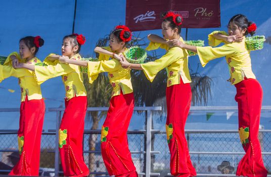 LAS VEGAS - FEB 09 : Chinese folk dancers perform at the Chinese New Year celebrations held in Las Vegas , Nevada on February 09 2014