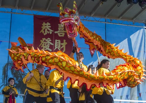 LAS VEGAS - FEB 09 : Dragon dance performers during the Chinese New Year celebrations held in Las Vegas , Nevada on February 09 2014